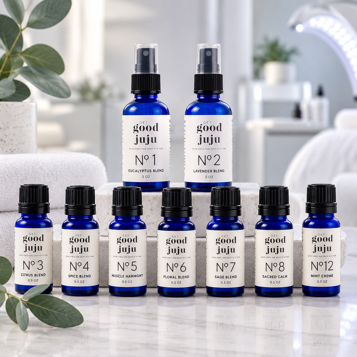 Get Good Juju 100% Essential Oil Blends collection featuring No. 1 through No. 12 in blue bottles